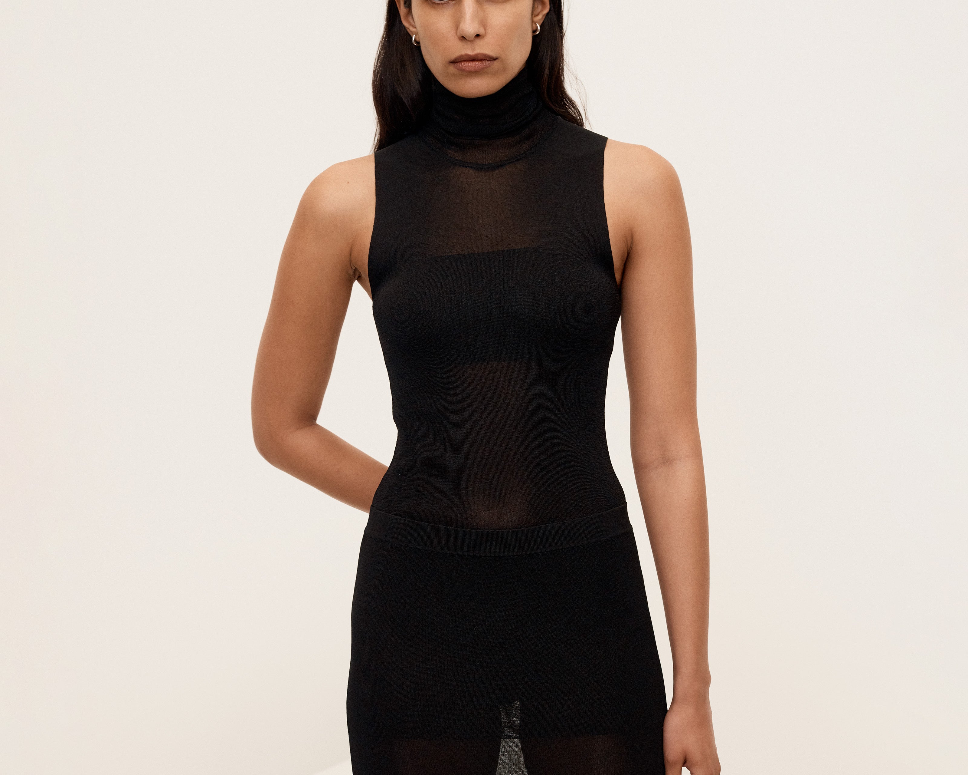 sener-besim-the-sleeveless-turtleneck-black-knitwear